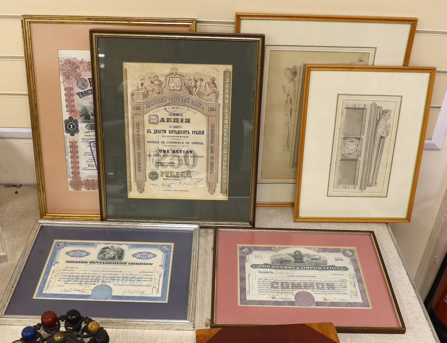 Four framed share certificates and two religious engravings